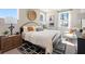 Well-lit bedroom featuring contemporary decor, multiple windows, and a comfortable bed at 3248 Shirecrest Ln, Dacula, GA 30019
