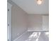 An empty bedroom has neutral paint and carpet at 3460 Village Park Sw Ln, Atlanta, GA 30331