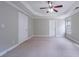 Bedroom featuring trey ceilings, neutral walls and trim, and plush carpeting at 3460 Village Park Sw Ln, Atlanta, GA 30331