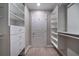 Walk-in closet with built in shelving and drawers at 3460 Village Park Sw Ln, Atlanta, GA 30331
