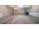 Spacious garage featuring an automatic door opener, ample room for vehicles, and neutral wall tones at 3460 Village Park Sw Ln, Atlanta, GA 30331