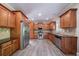 Spacious kitchen with custom wood cabinets, stainless steel appliances, and granite countertops at 3460 Village Park Sw Ln, Atlanta, GA 30331