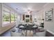 Bright and airy living area with a cozy fireplace and open floor plan at 3460 Village Park Sw Ln, Atlanta, GA 30331