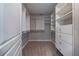 Walk-in closet with built-in shelving and drawers for optimal storage at 3460 Village Park Sw Ln, Atlanta, GA 30331