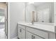 A clean and bright bathroom featuring white countertops, ample lighting, and modern fixtures at 2410 Bridle Bridge Trl, Cumming, GA 30040