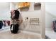Walk-in closet with ample shelving and hanging space for organized storage at 2410 Bridle Bridge Trl, Cumming, GA 30040