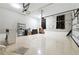 A spacious garage with ample storage and a roll-up door at 2410 Bridle Bridge Trl, Cumming, GA 30040