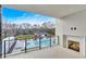 A balcony view showcasing the pool and an outdoor fireplace, offering an inviting and relaxing outdoor space at 2520 Peachtree Nw Rd # 403, Atlanta, GA 30305