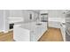 Gorgeous kitchen with oversized island, modern appliances, and sleek cabinetry at 2520 Peachtree Nw Rd # 403, Atlanta, GA 30305