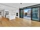 Bright, open kitchen with stainless steel appliances, island and access to outdoor patio at 2520 Peachtree Nw Rd # 403, Atlanta, GA 30305
