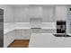 Sleek, bright kitchen with stainless steel appliances, white cabinets, and modern design at 2520 Peachtree Nw Rd # 403, Atlanta, GA 30305
