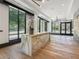 Bright and airy lobby featuring a marble reception desk and elegant hardwood floors at 2520 Peachtree Nw Rd # 403, Atlanta, GA 30305