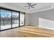 Light-filled main bedroom with a private balcony overlooking lush greenery at 2520 Peachtree Nw Rd # 403, Atlanta, GA 30305