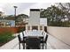 Elegant outdoor dining area with a fireplace, ideal for entertaining and enjoying the outdoors at 2520 Peachtree Nw Rd # 403, Atlanta, GA 30305