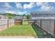 Fenced backyard showcasing a green lawn perfect for outdoor enjoyment and recreation at 2530 Marlin Dr, Mcdonough, GA 30253