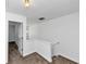 Bright hallway featuring neutral carpet, crisp white walls and trim, and modern lighting at 2530 Marlin Dr, Mcdonough, GA 30253