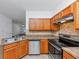 Kitchen with stainless steel appliances and tiled floors at 2530 Marlin Dr, Mcdonough, GA 30253