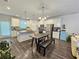 Well-lit kitchen featuring stainless steel appliances, and hardwood floors at 261 Mahone Dr, Lilburn, GA 30047