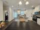 View of the kitchen showcasing granite countertops, stainless steel appliances, and dining area at 261 Mahone Dr, Lilburn, GA 30047