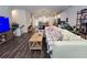 Cozy living room with hardwood floors, a comfortable couch, and open floor plan at 261 Mahone Dr, Lilburn, GA 30047