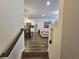 Open-concept living space with kitchen, living, and dining areas at 261 Mahone Dr, Lilburn, GA 30047