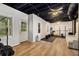 Finished basement featuring laminate flooring, and home gym equipment at 300 Wesfork Nw Way, Suwanee, GA 30024