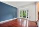 Spacious living room with cherry floors, bright natural light and bay window at 300 Wesfork Nw Way, Suwanee, GA 30024