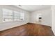 Open living space with gleaming hardwood floors and plenty of natural light at 3723 Glenwood Rd, Decatur, GA 30032