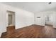 Spacious living room with hardwood floors and natural light from the large window at 3723 Glenwood Rd, Decatur, GA 30032