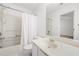 Clean bathroom with tub/shower combination and ample counter space at 1135 Kilmington Ct, Alpharetta, GA 30009