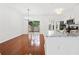 Open dining area with sliding glass doors and hardwood flooring at 1135 Kilmington Ct, Alpharetta, GA 30009