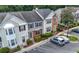 Charming townhomes feature colorful accents, manicured landscaping, and convenient parking at 1135 Kilmington Ct, Alpharetta, GA 30009