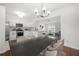 Bright open floor plan featuring a modern kitchen with updated appliances at 1135 Kilmington Ct, Alpharetta, GA 30009