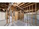 Unfinished basement with exposed framing, painted floors, and visible ductwork at 1348 Timberland Se Dr, Marietta, GA 30067