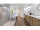 Bathroom featuring a glass shower, soaking tub, and double sink vanity at 1348 Timberland Se Dr, Marietta, GA 30067