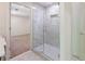 Modern bathroom showcasing a glass enclosed shower with tile surround and neutral colors at 1348 Timberland Se Dr, Marietta, GA 30067