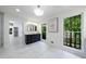 Bright bathroom featuring a vanity, large windows and decorative art at 1348 Timberland Se Dr, Marietta, GA 30067