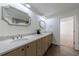 Spacious bathroom with double sink vanity, modern fixtures, quartz countertop, and beautiful flooring at 1348 Timberland Se Dr, Marietta, GA 30067