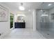 Bathroom with modern design, vanity with mirror and large tiled shower at 1348 Timberland Se Dr, Marietta, GA 30067
