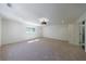 Large bedroom with plush carpeting, natural light, and an ensuite bathroom, offering a comfortable retreat at 1348 Timberland Se Dr, Marietta, GA 30067