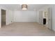 Bright bedroom with hardwood floors and two open doorways, offering versatile layout options at 1348 Timberland Se Dr, Marietta, GA 30067