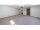 Expansive bedroom with plush carpeting, ample natural light, and access to a bathroom, perfect for relaxation at 1348 Timberland Se Dr, Marietta, GA 30067