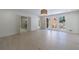 A view of a sunlit bedroom leading to a patio area and glass enclosed shower at 1348 Timberland Se Dr, Marietta, GA 30067