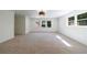 Spacious bedroom with carpet, windows, and ensuite bath access at 1348 Timberland Se Dr, Marietta, GA 30067