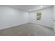 Carpeted room featuring white walls, a window and recessed lighting at 1348 Timberland Se Dr, Marietta, GA 30067