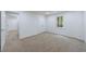 A bright bedroom has carpeted floors, natural light and a closet for storage at 1348 Timberland Se Dr, Marietta, GA 30067