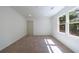 Bedroom featuring plush carpeting, a large window, and closet at 1348 Timberland Se Dr, Marietta, GA 30067