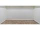 Walk-in closet with carpeting and shelving at 1348 Timberland Se Dr, Marietta, GA 30067