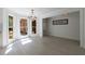 Bright dining area featuring hardwood floors, large windows, and stylish chandelier at 1348 Timberland Se Dr, Marietta, GA 30067