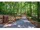 Long driveway leads to a brick home at 1348 Timberland Se Dr, Marietta, GA 30067